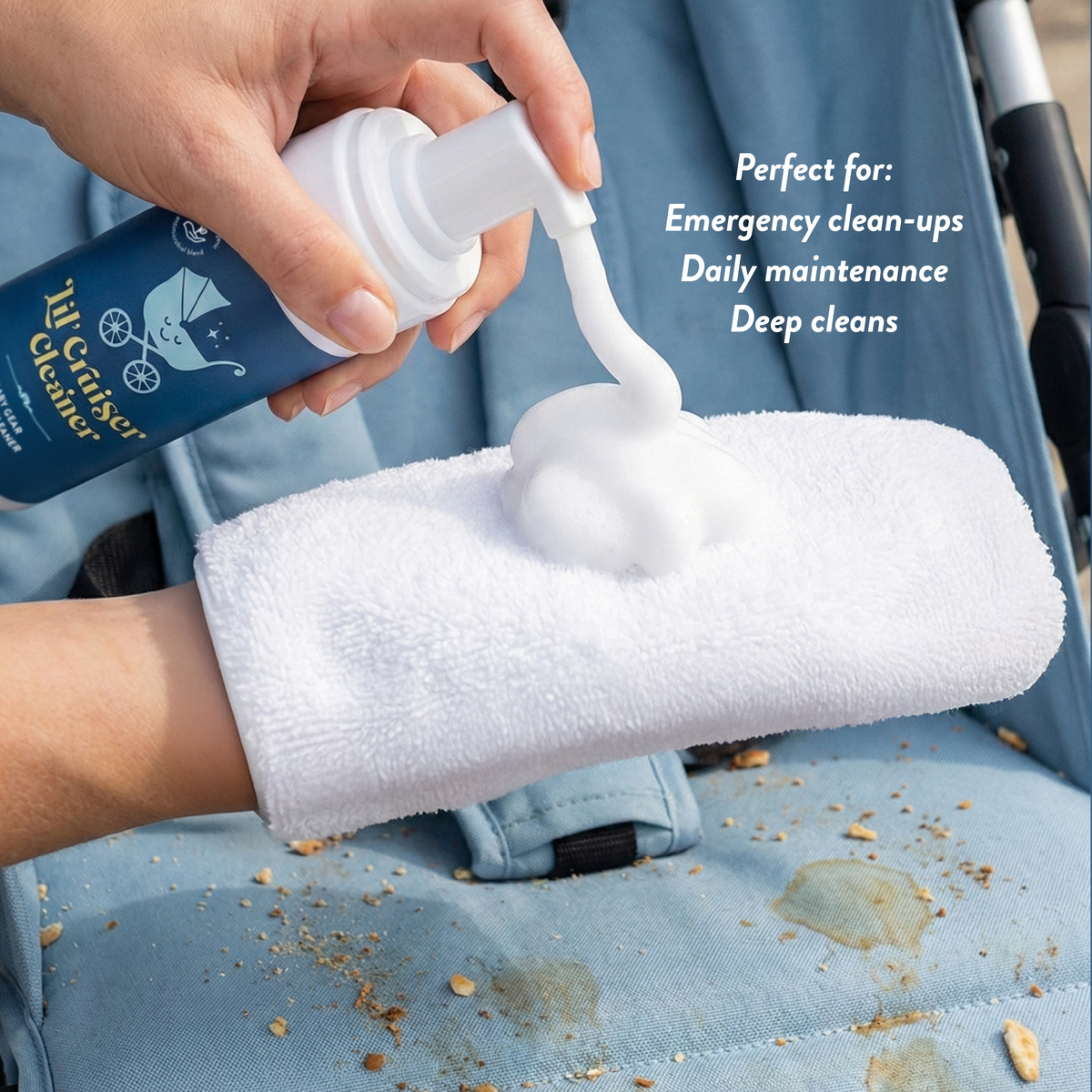 Foam applied to microfibre cleaning mitt before wiping dirty stroller fabric
